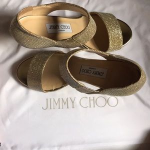 Size 6.5 gold Jimmy Choos
